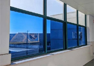 photochromic self-tint glass